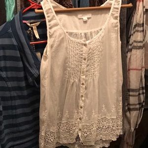 White sleeveless blouse